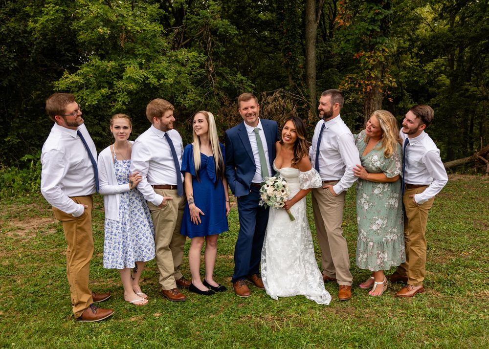 Family photos at their backyard garden wedding in Omaha, Nebraska. - BrightSide Photography