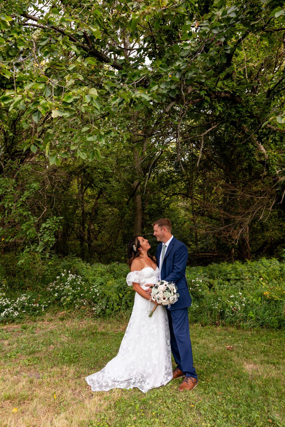 Bride & groom at their beautiful backyard wedding in Omaha, Nebraska. - BrightSide Photography