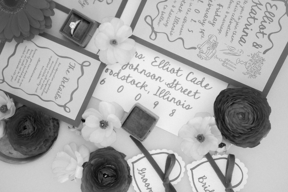 Black and white image of decorative cards and roses arranged on a flat surface. Events at Ethereal Courthouse Square