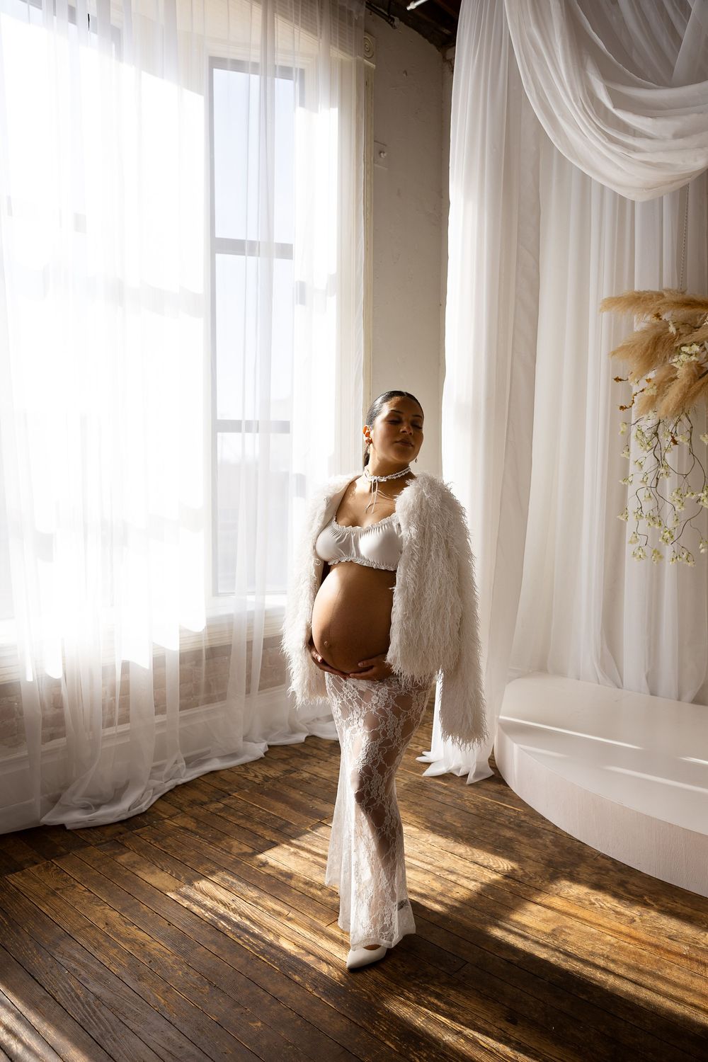 A series of four ethereal bridal portraits in a sunlit room with white curtains and rustic wooden floors.