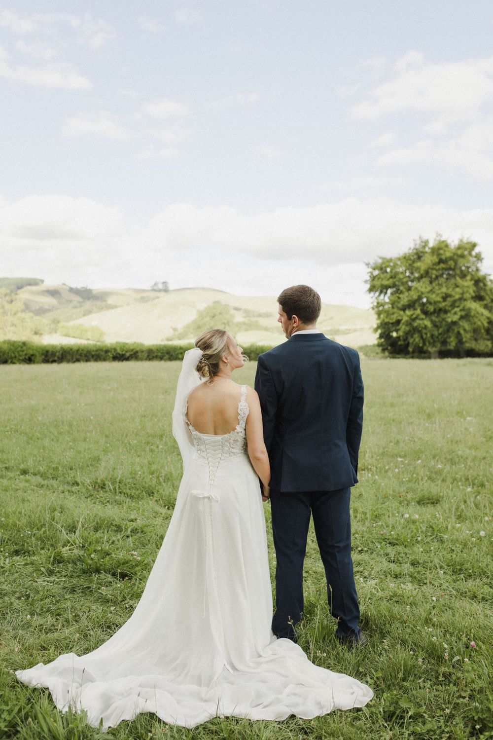 Bride and groom standing side by side at Rosenvale venue wedding