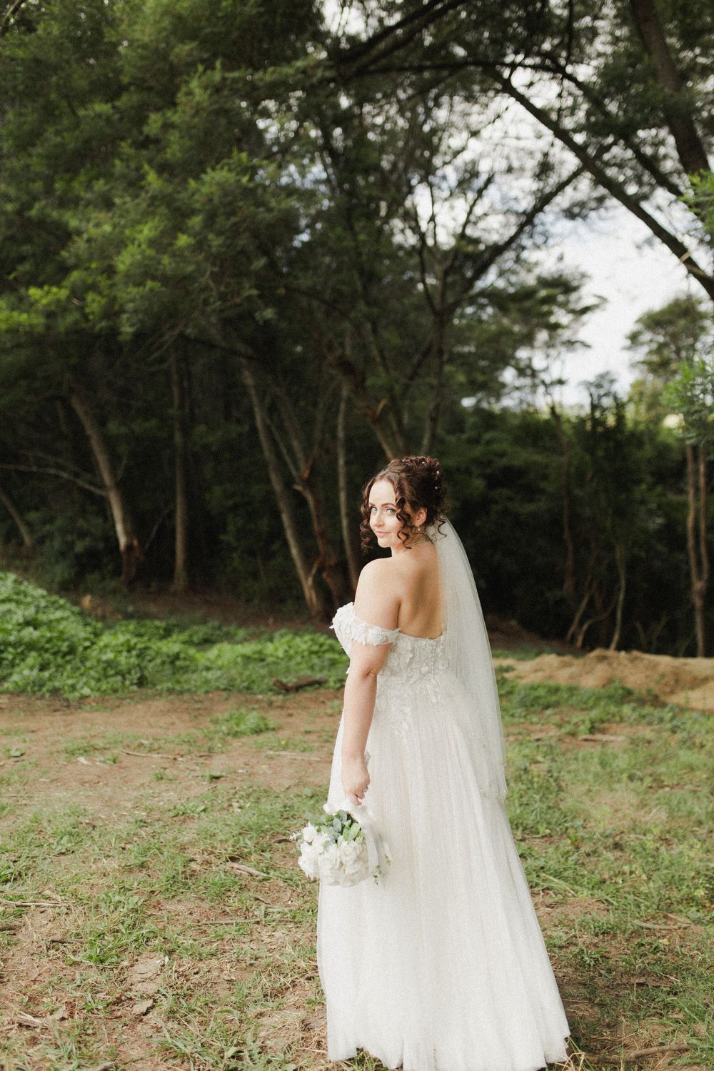Bride posing for portrait at Morrinsville wedding