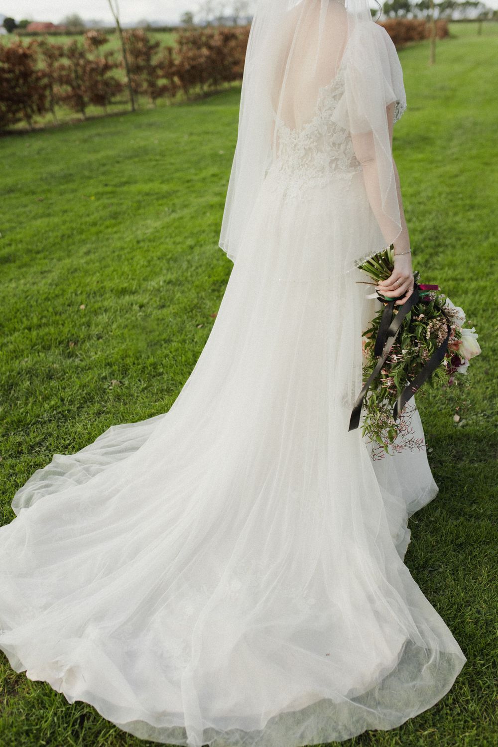 Wedding dress and florals at Woodlands Estate venue