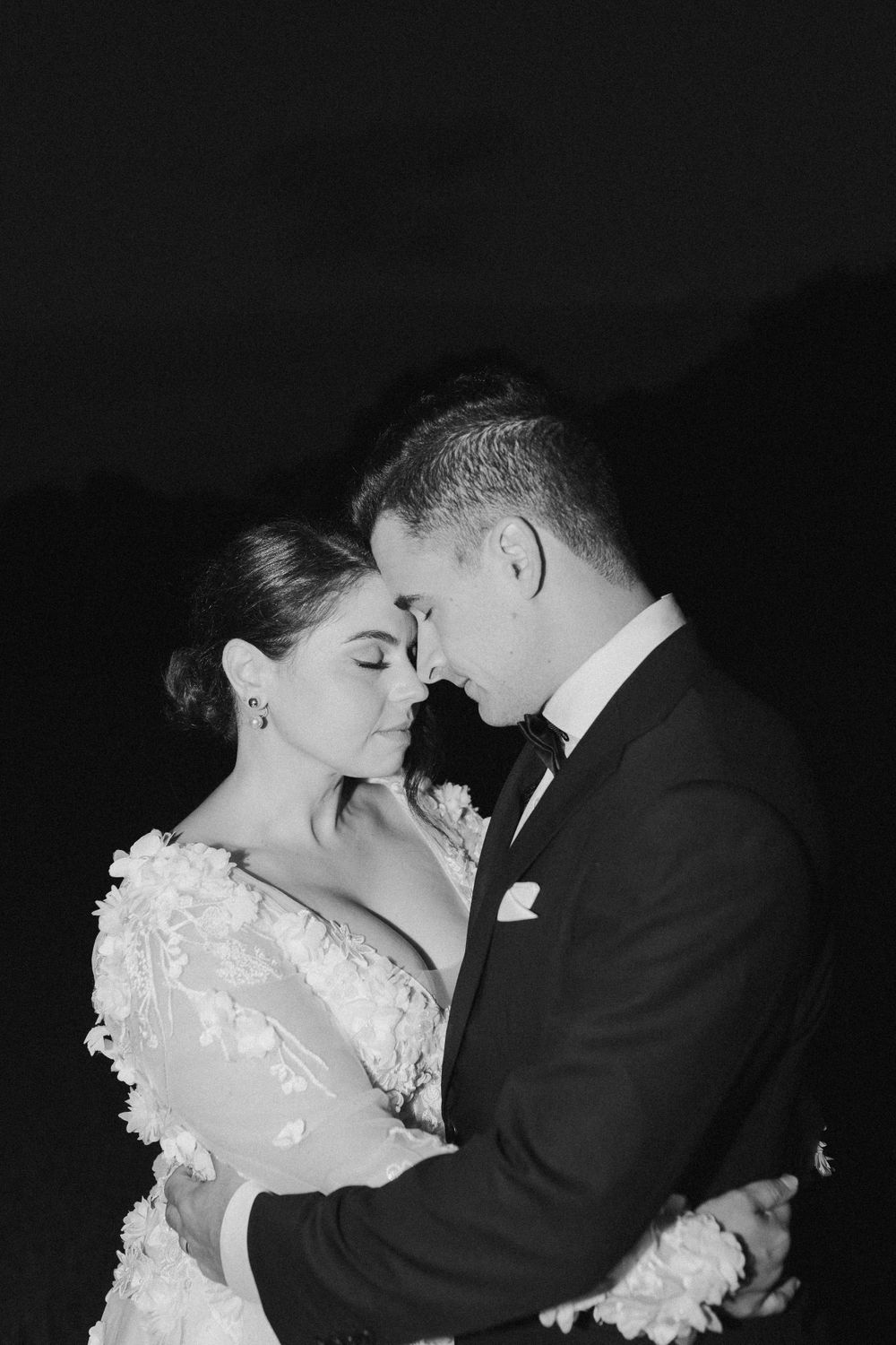 flash photography of husband and wife at auckland wedding