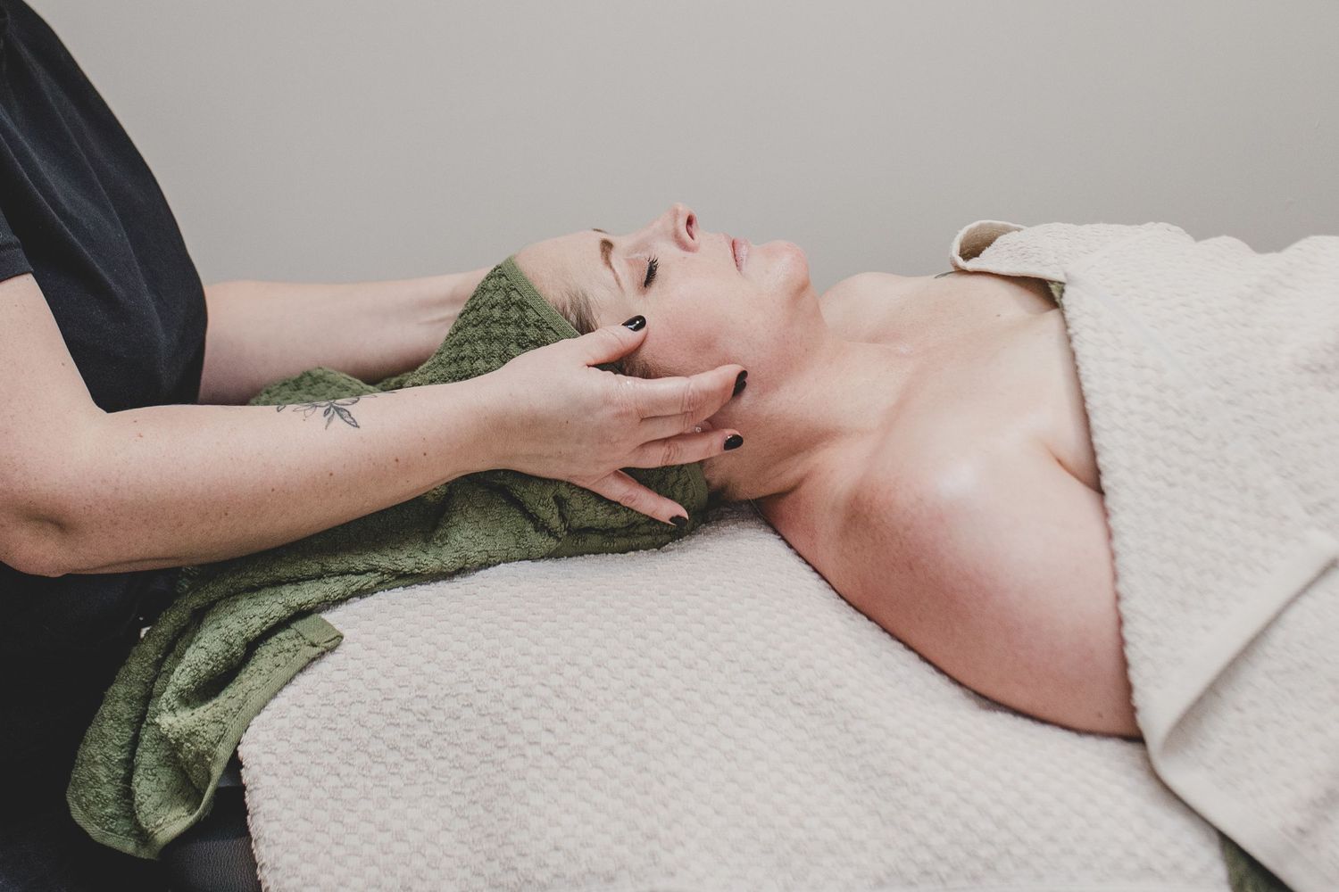 Relaxing massage therapy session with gentle head and neck treatment on a massage table.
Small Business Storytelling photography