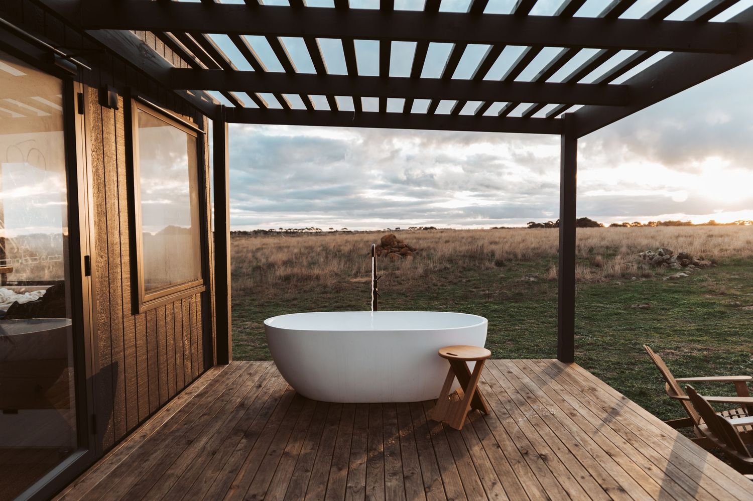 large outdoor bath on veranda at sunset. melbourne accommodation photographer
