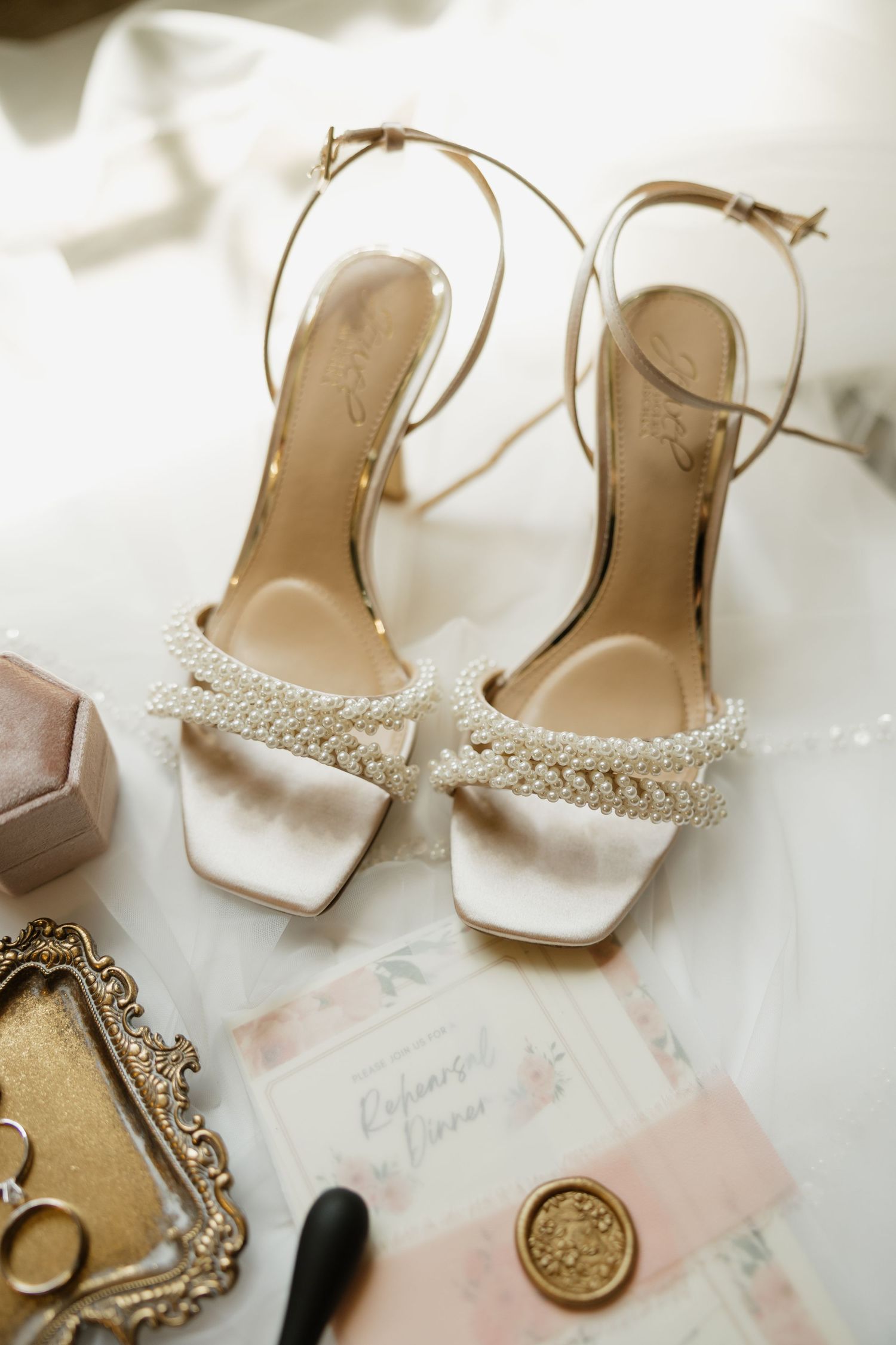 Elegant ivory bridal shoes with crystal embellishments displayed in sequence against a soft neutral background.