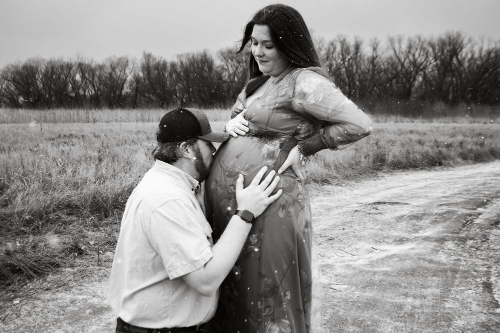 An expecting couple during a maternity photo session in Amarillo, Texas