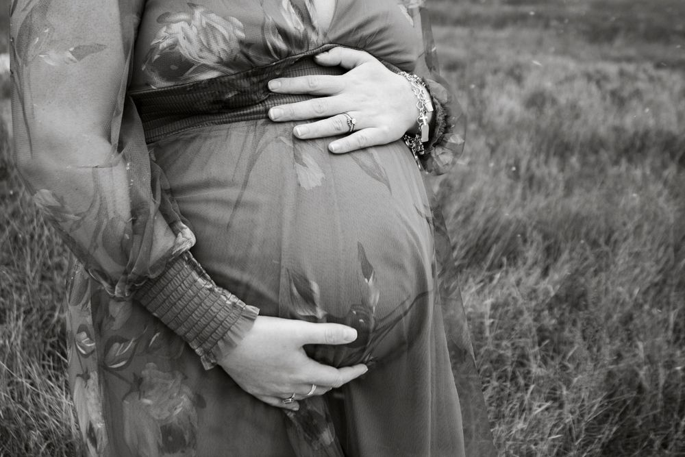 An expecting mother during a maternity photo session in Amarillo, Texas