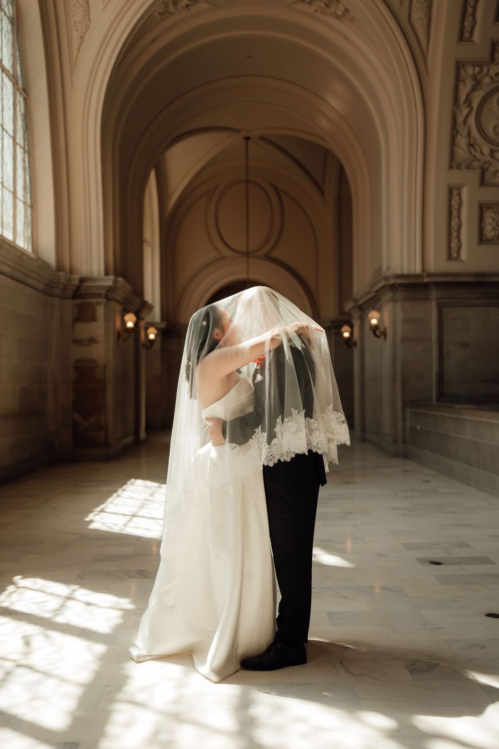 A series of artistic wedding photos showing a couple in formal attire with flowing veil in an elegant palace interior.