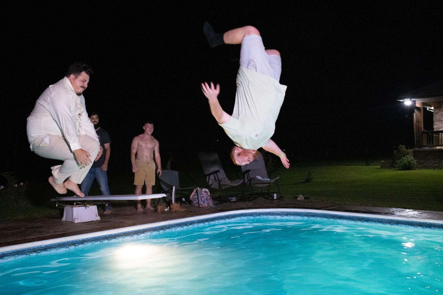 A sequence of photos showing someone jumping into a glowing blue swimming pool at night.
