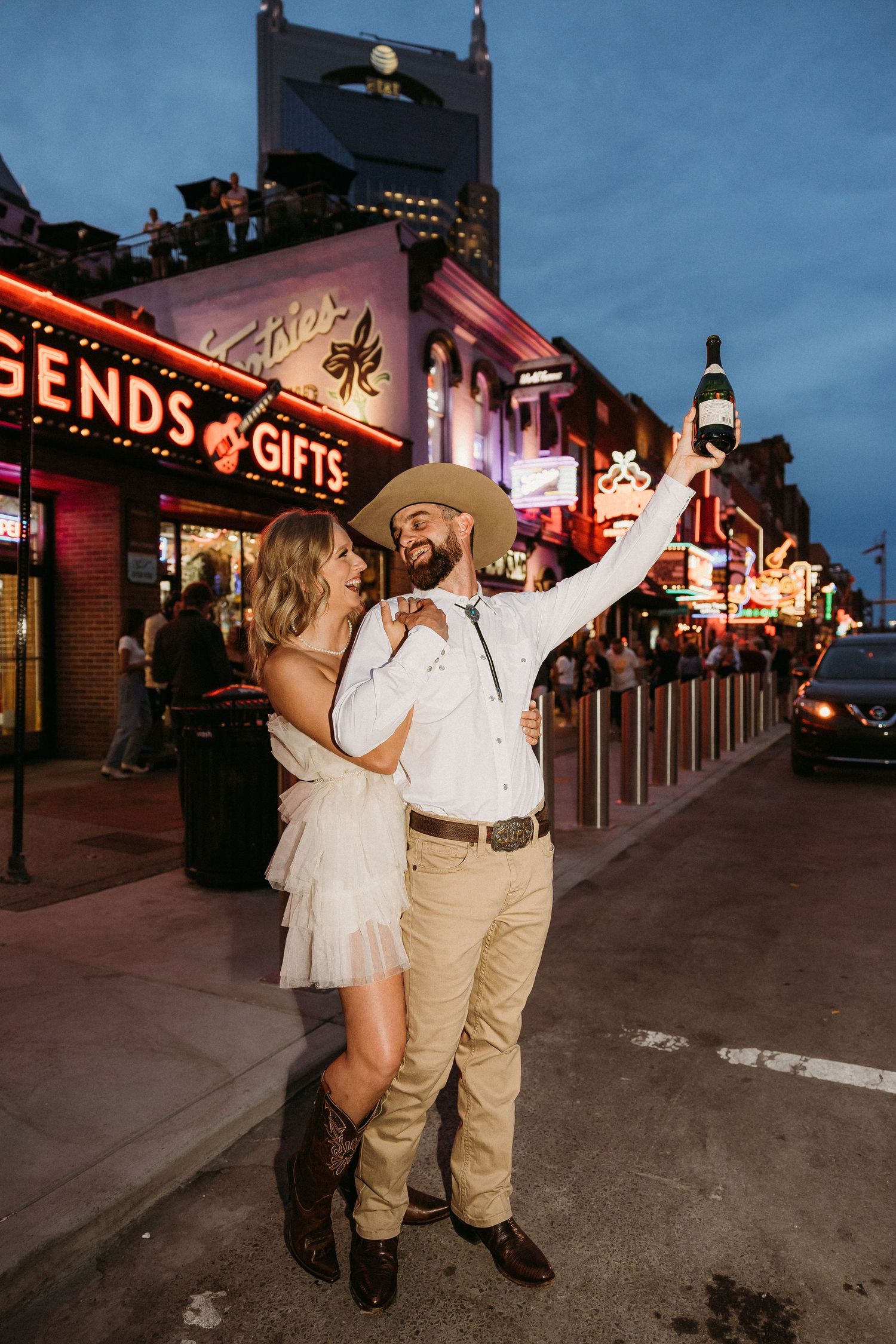 elope Nashville Photographer broadway celebration downtown elopement couple neon lights