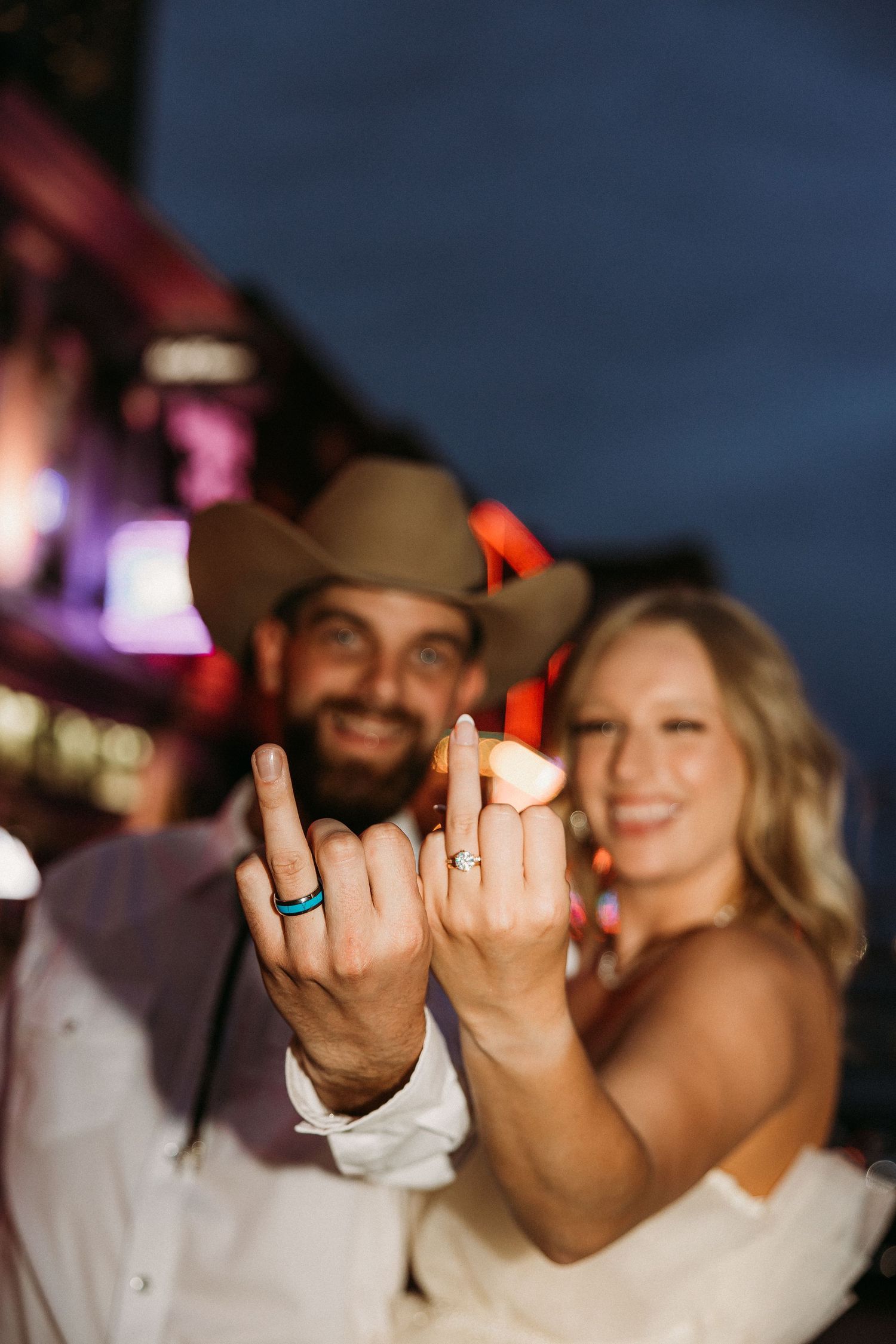 elope Nashville Photographer broadway celebration downtown elopement couple neon lights