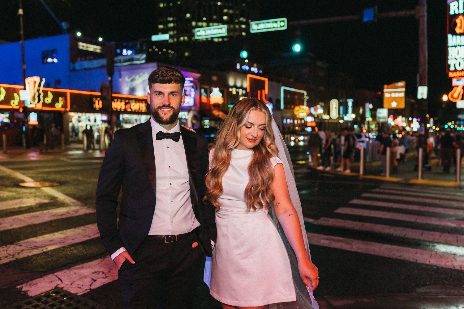 elope Nashville Photographer broadway celebration downtown elopement couple neon lights