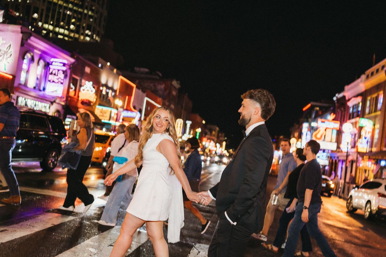 elope Nashville Photographer broadway celebration downtown elopement couple neon lights