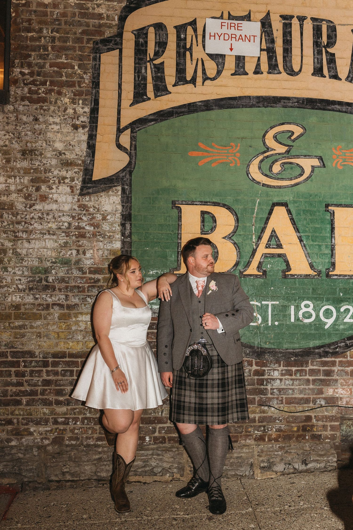 elope Nashville Photographer broadway celebration downtown elopement couple neon lights