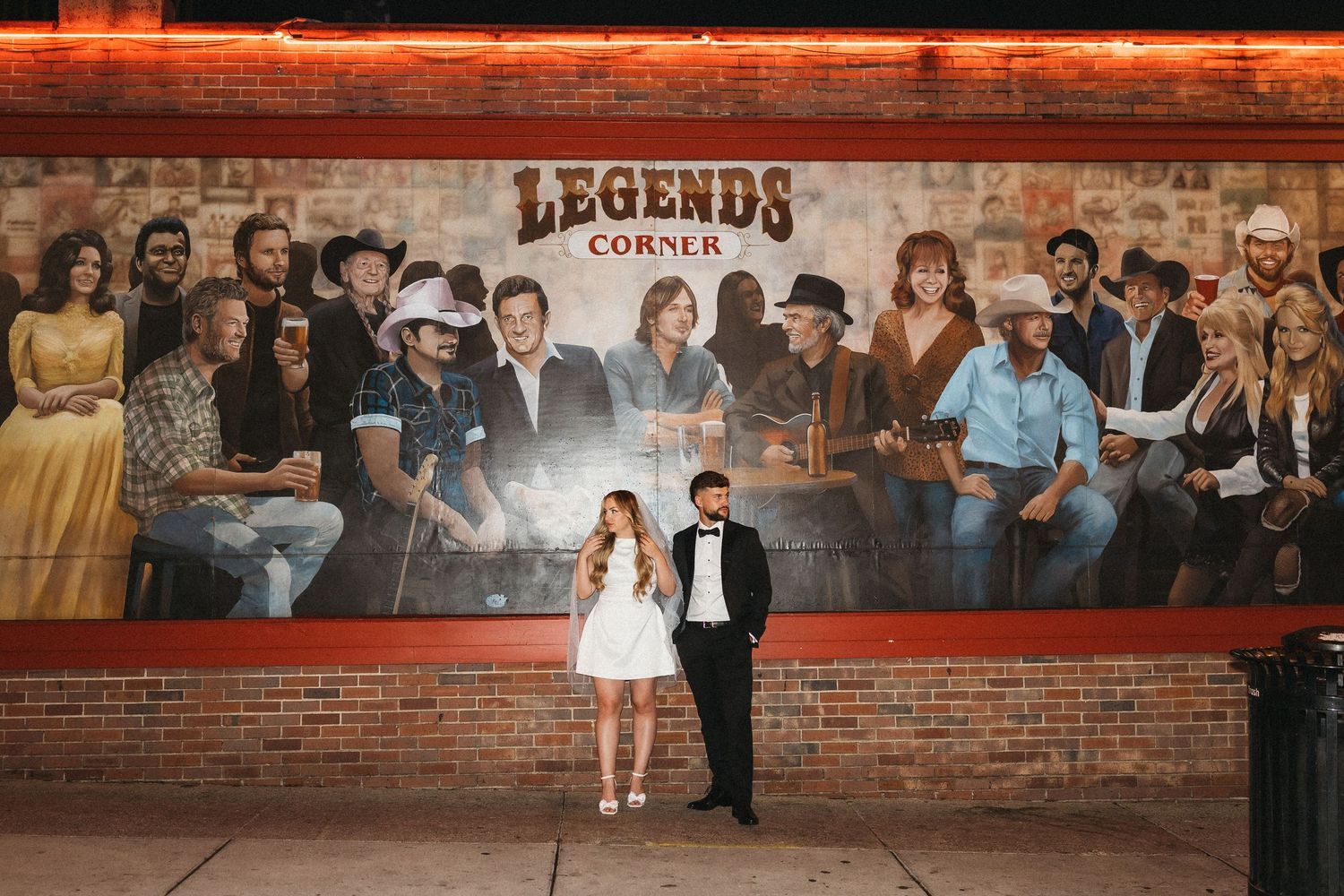 elope Nashville Photographer broadway celebration downtown elopement couple neon lights