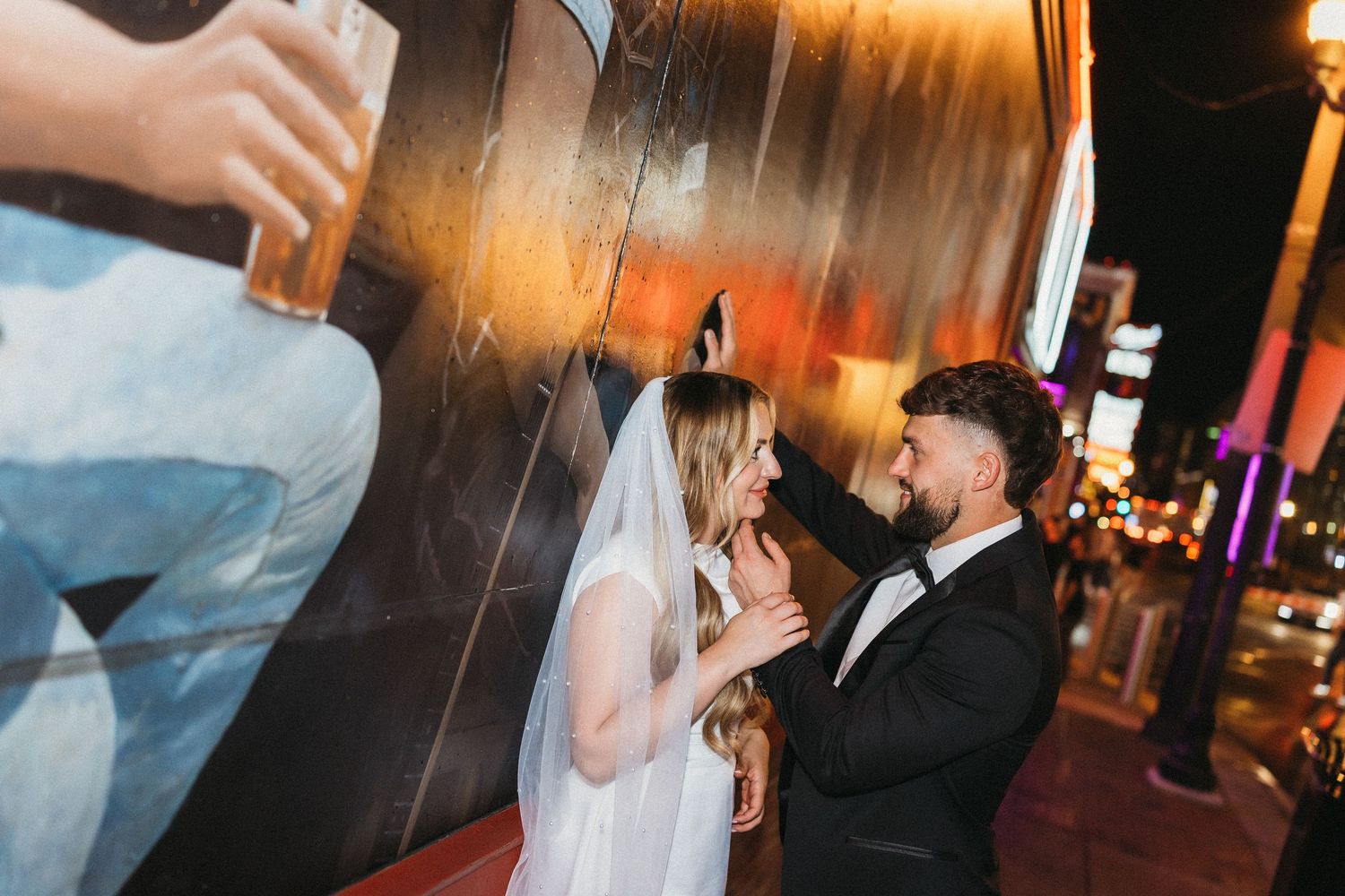 elope Nashville Photographer broadway celebration downtown elopement couple neon lights
