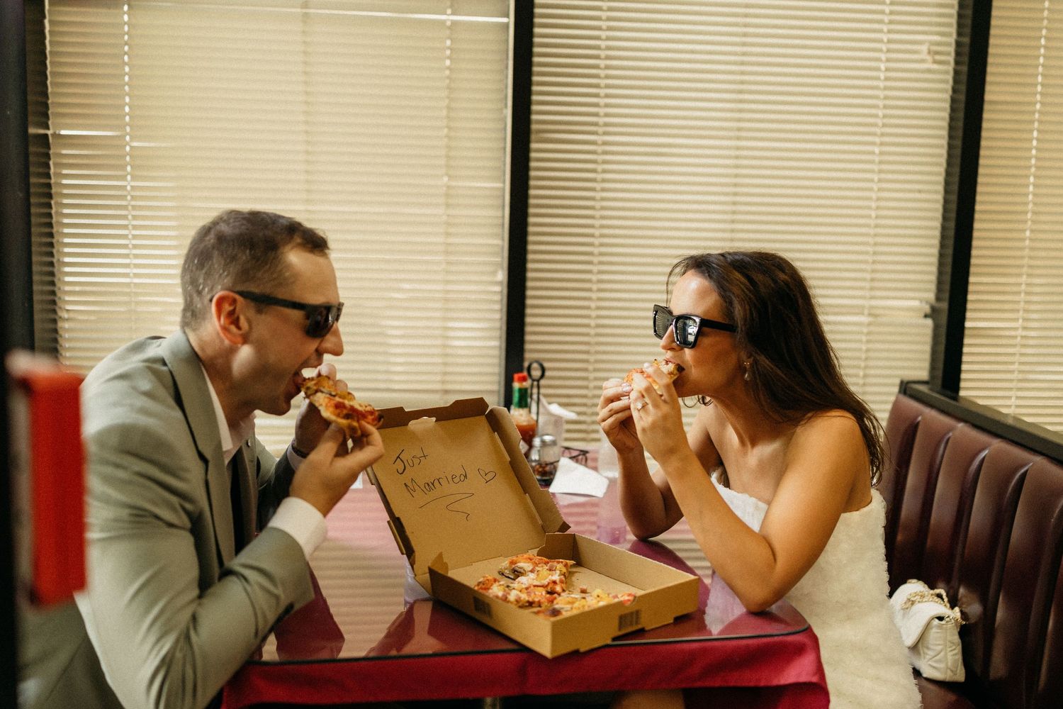 elope Nashville Photographer broadway celebration downtown elopement couple pizza