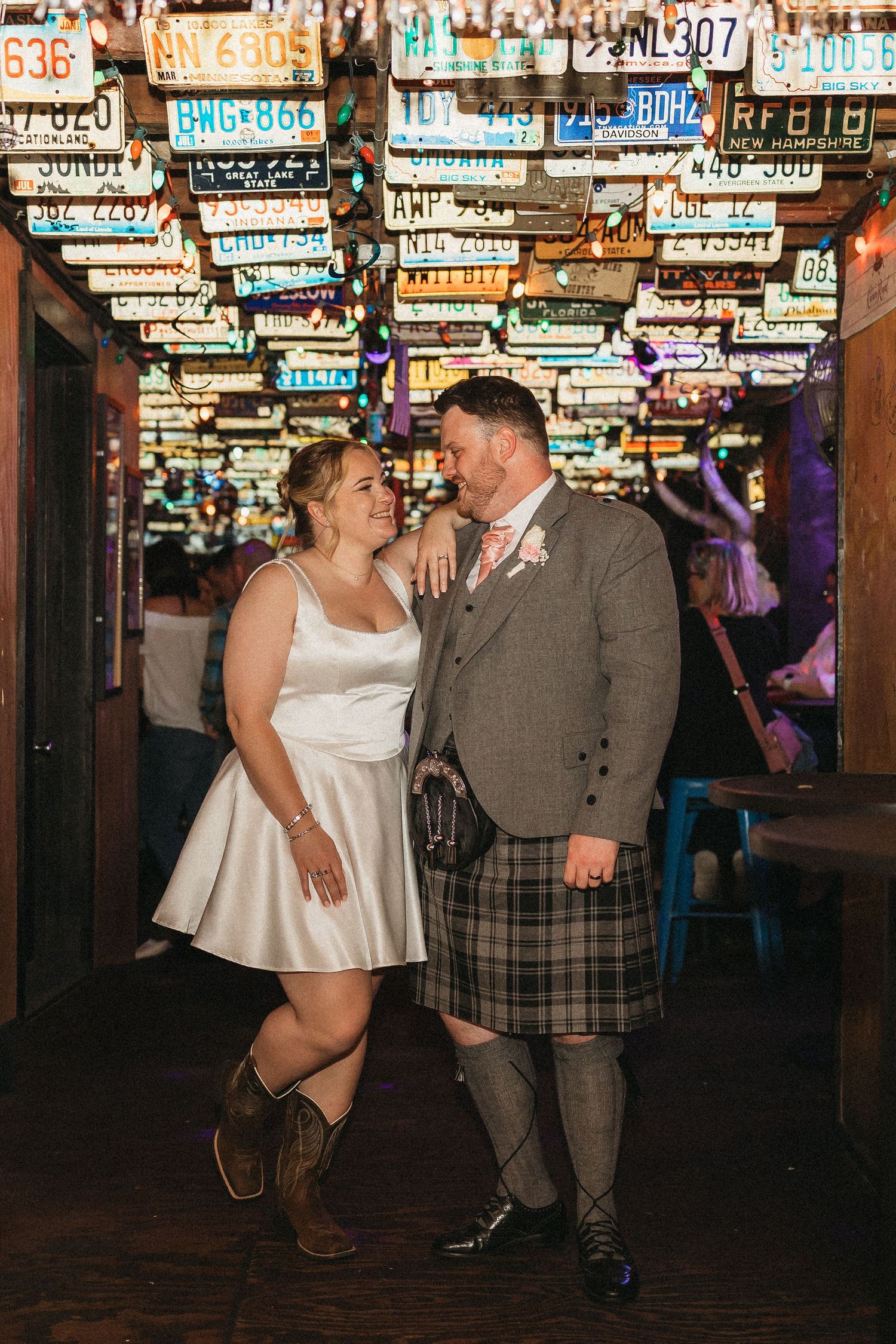 elope Nashville Photographer broadway celebration downtown elopement couple neon lights