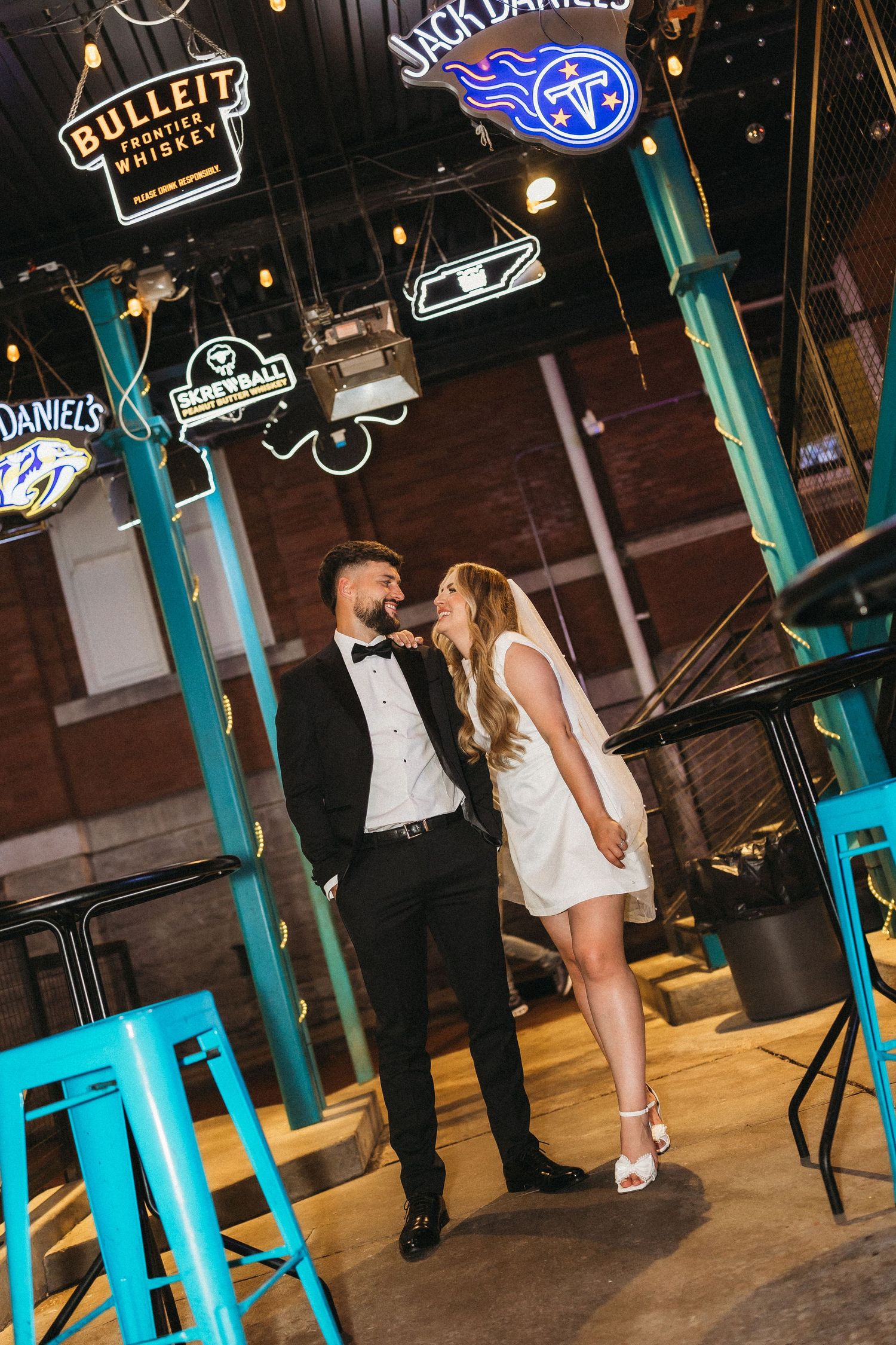 elope Nashville Photographer broadway celebration downtown elopement couple neon lights