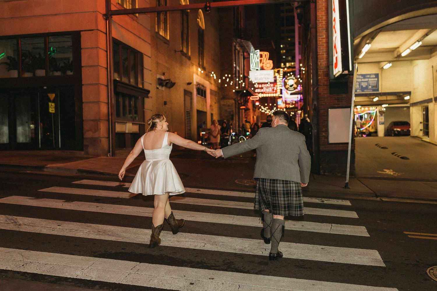 elope Nashville Photographer broadway celebration downtown elopement couple neon lights