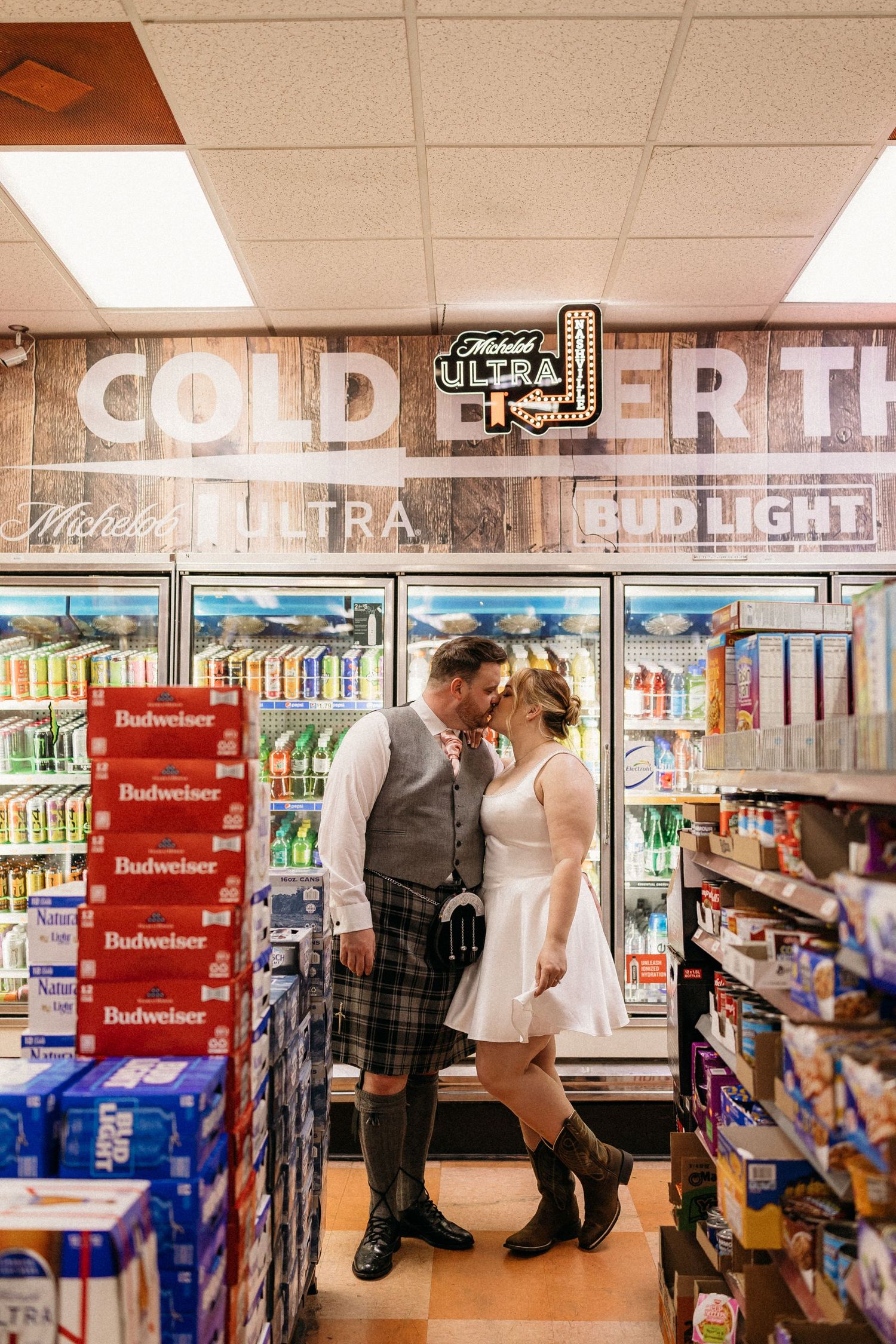 elope Nashville Photographer broadway celebration downtown elopement couple neon lights