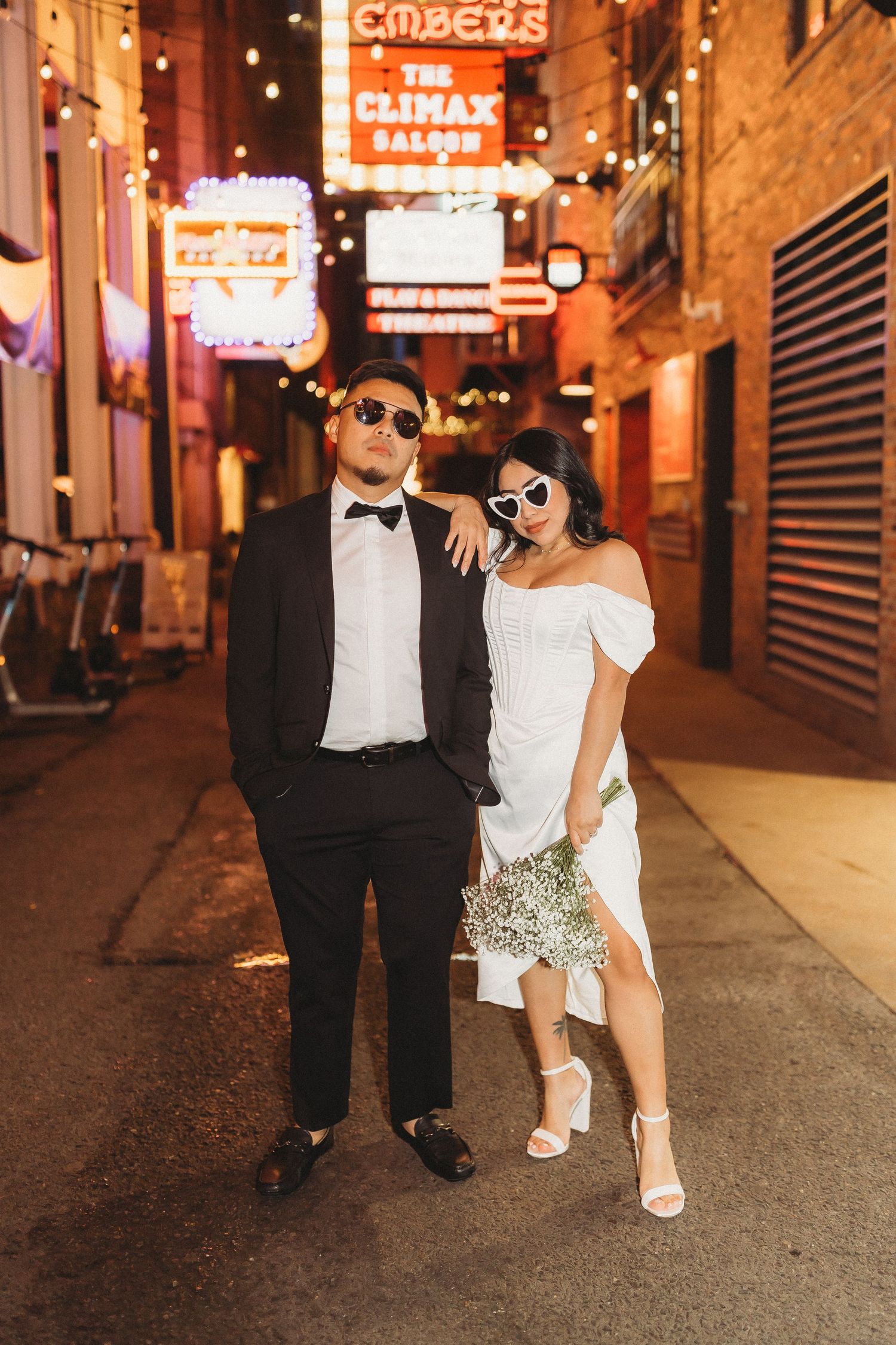 elope Nashville Photographer broadway celebration downtown elopement couple neon lights