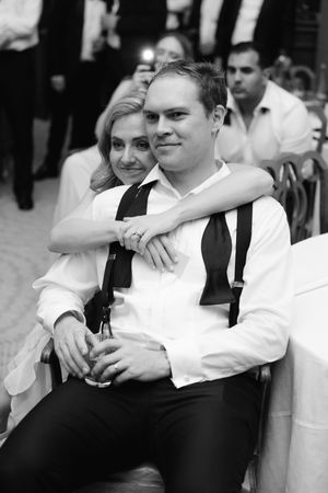 A series of black and white photos showing a couple in formal attire sharing intimate moments together.