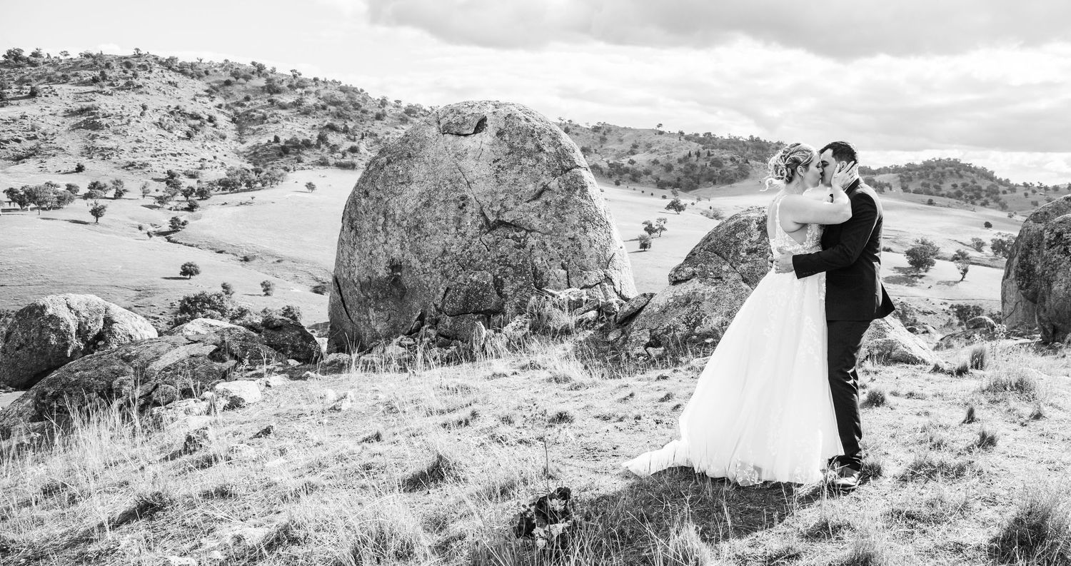 Black and white landscape photography of rocky hills and mountains.