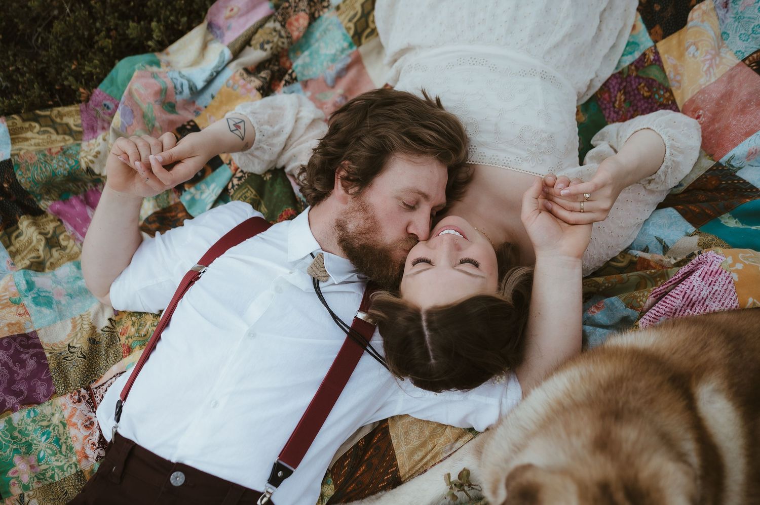 Romantic wedding portrait with majestic Canadian Rocky Mountains creating a dramatic backdrop.