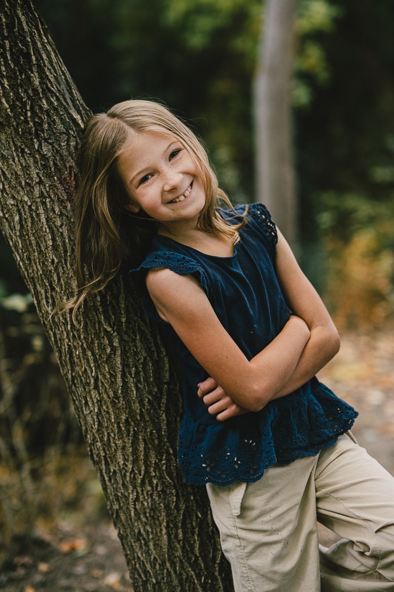 fall family photos with Michelle Deppe Photography in Kaysville, Utah at Gailey trail with trees and leaves.