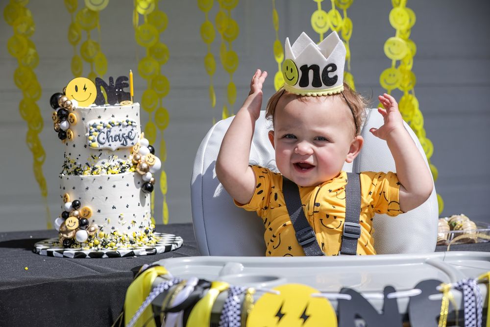 Boy with cake at Birthday party