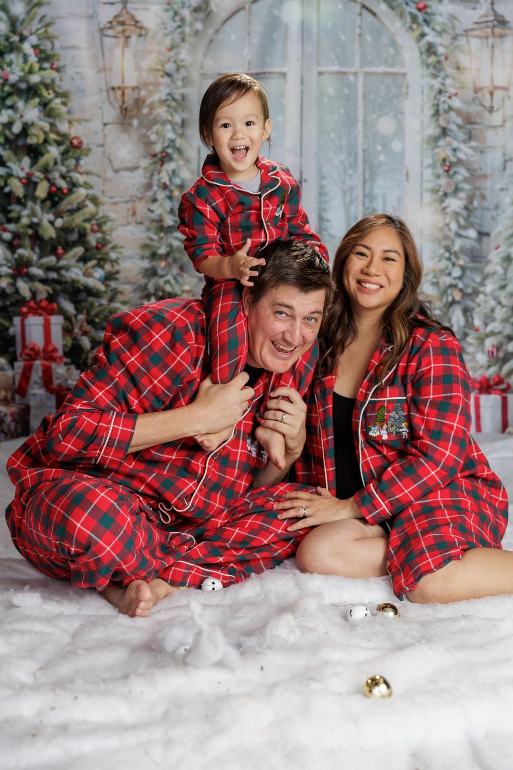 Family photo on snowy white background