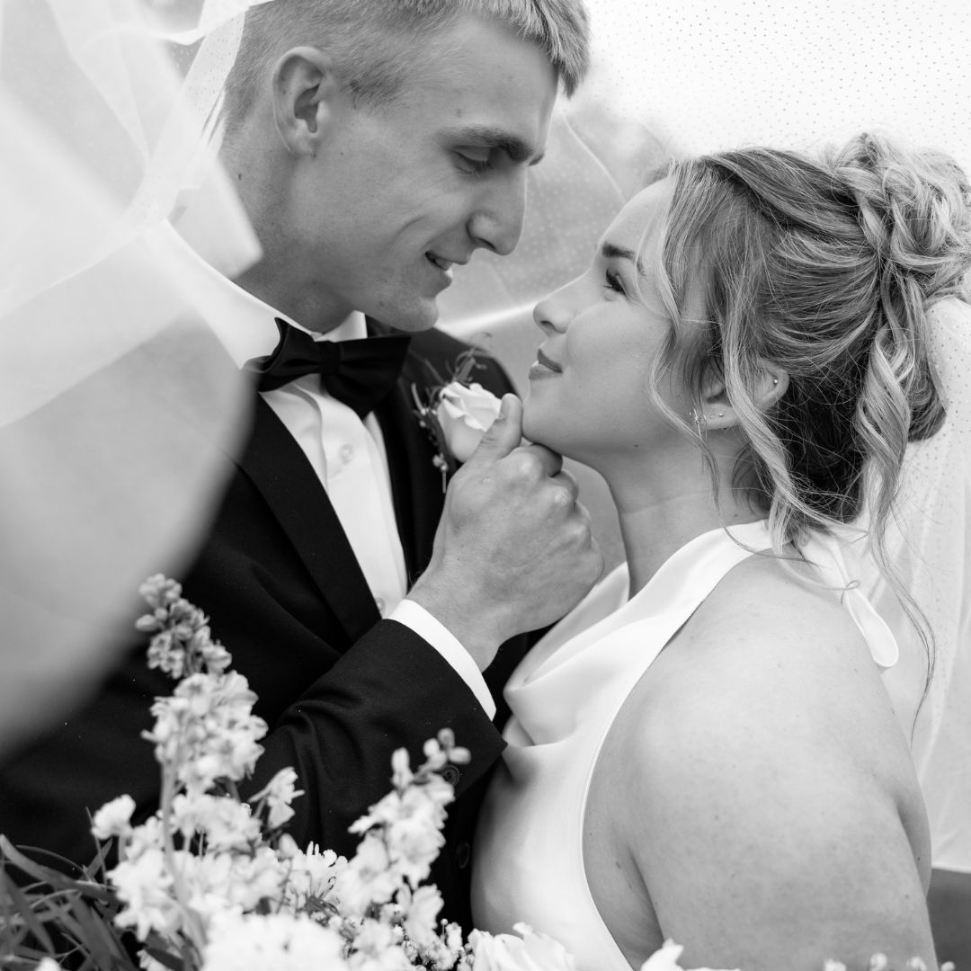 Intimate black and white wedding portraits showing tender moments.