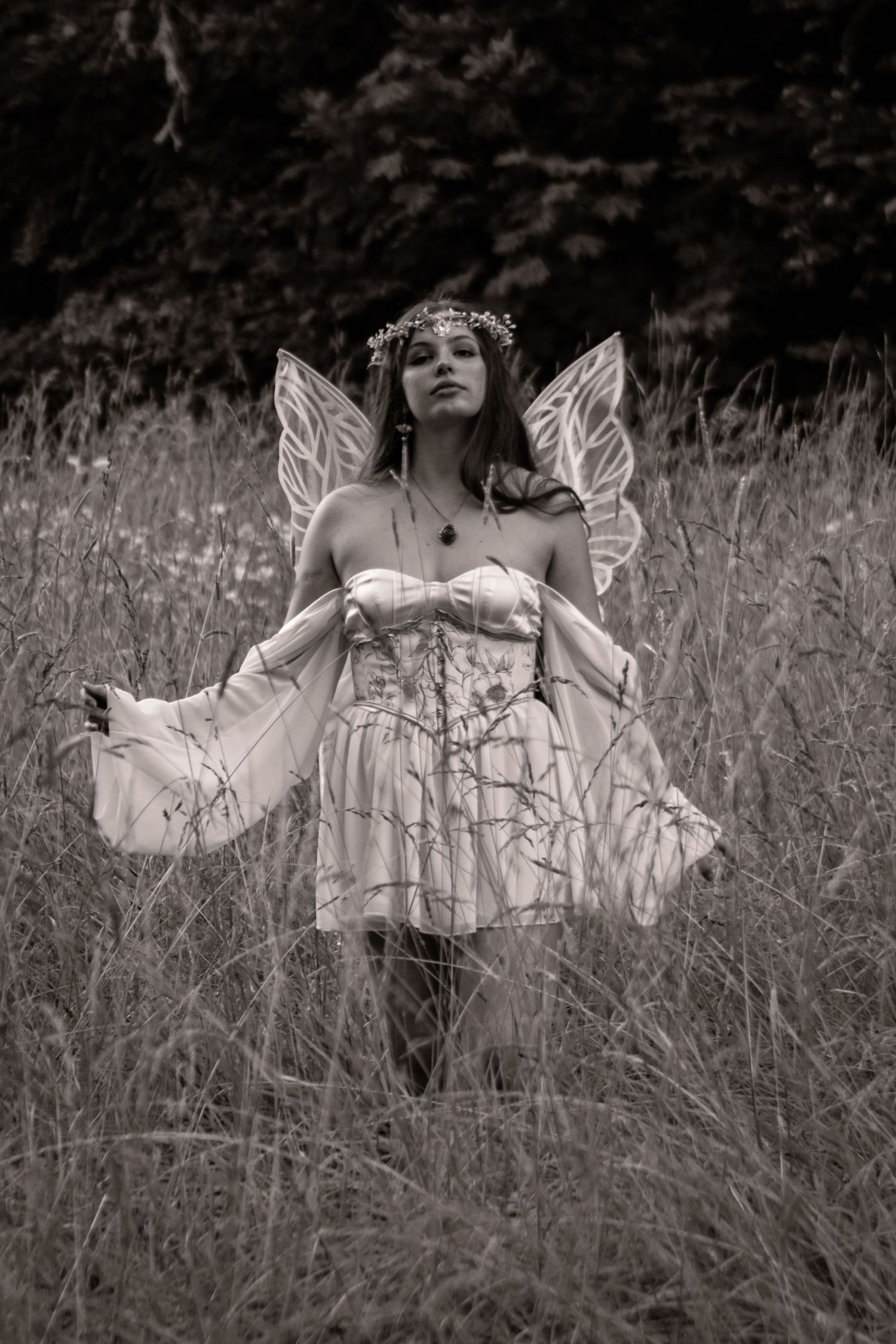 Black and white fantasy portrait of a young white model