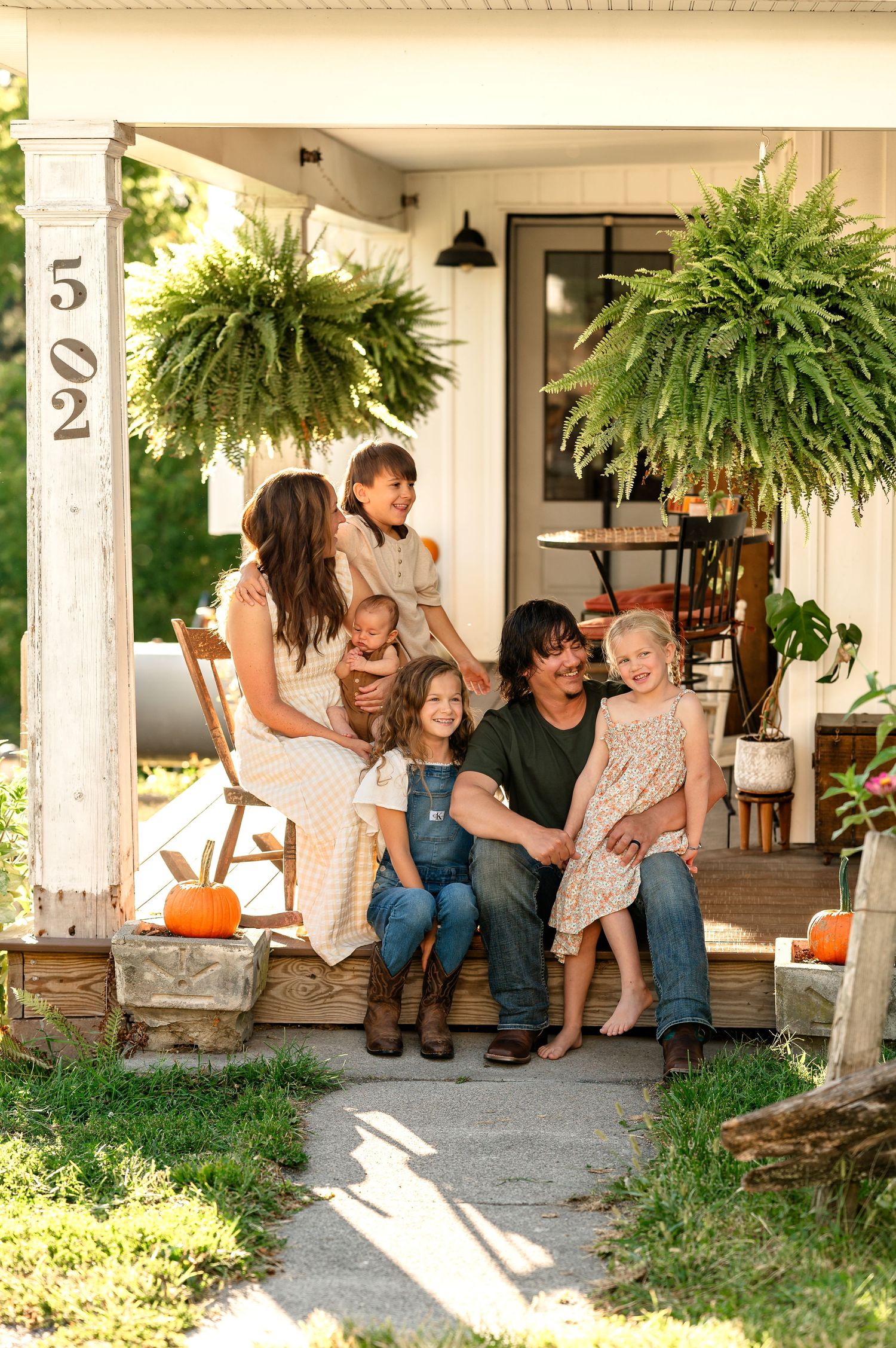 family on porch created by Storms Photography Pennsylvania photographer