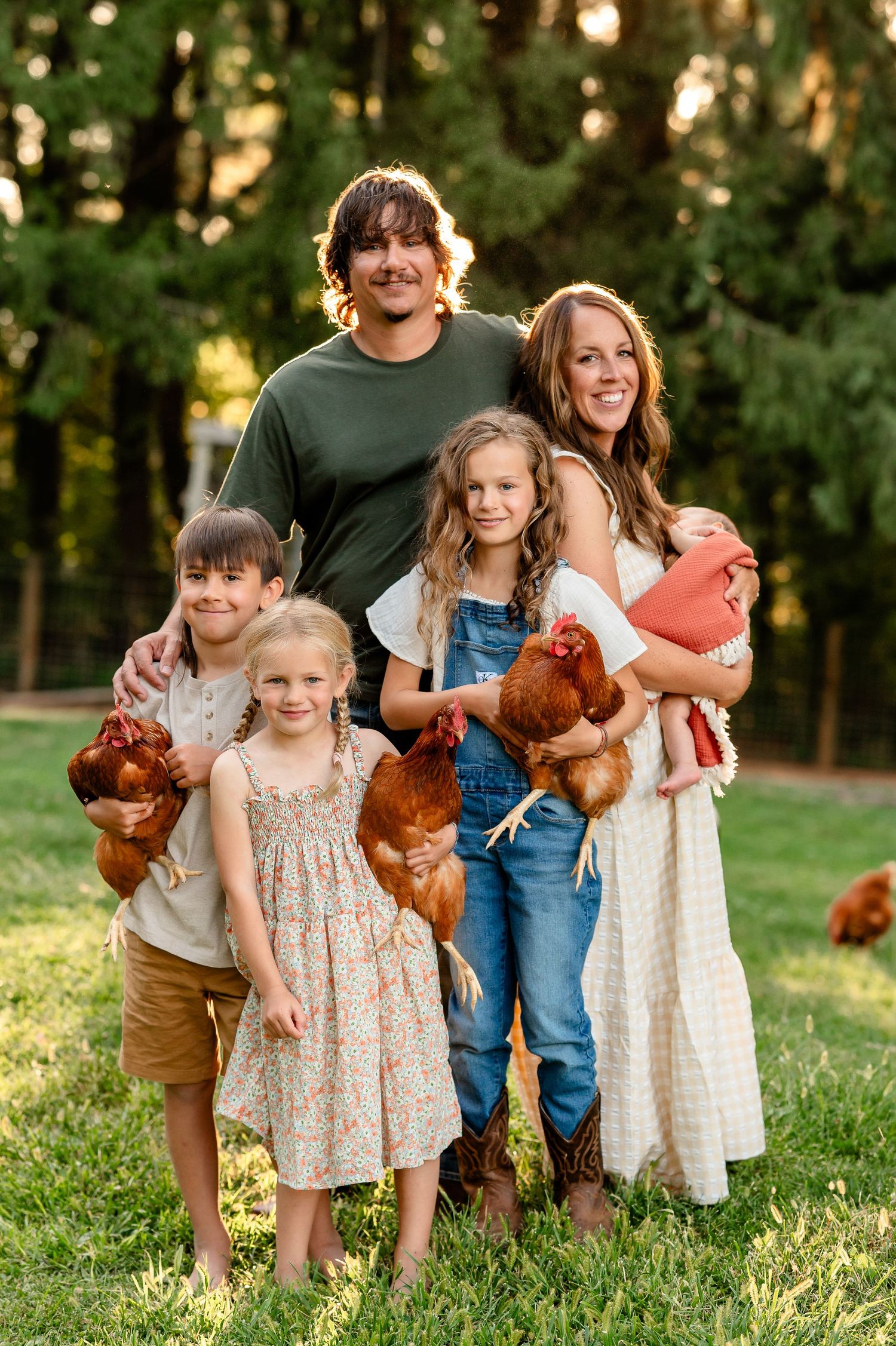 family holding chickens created by Storms Photography Pennsylvania photographer