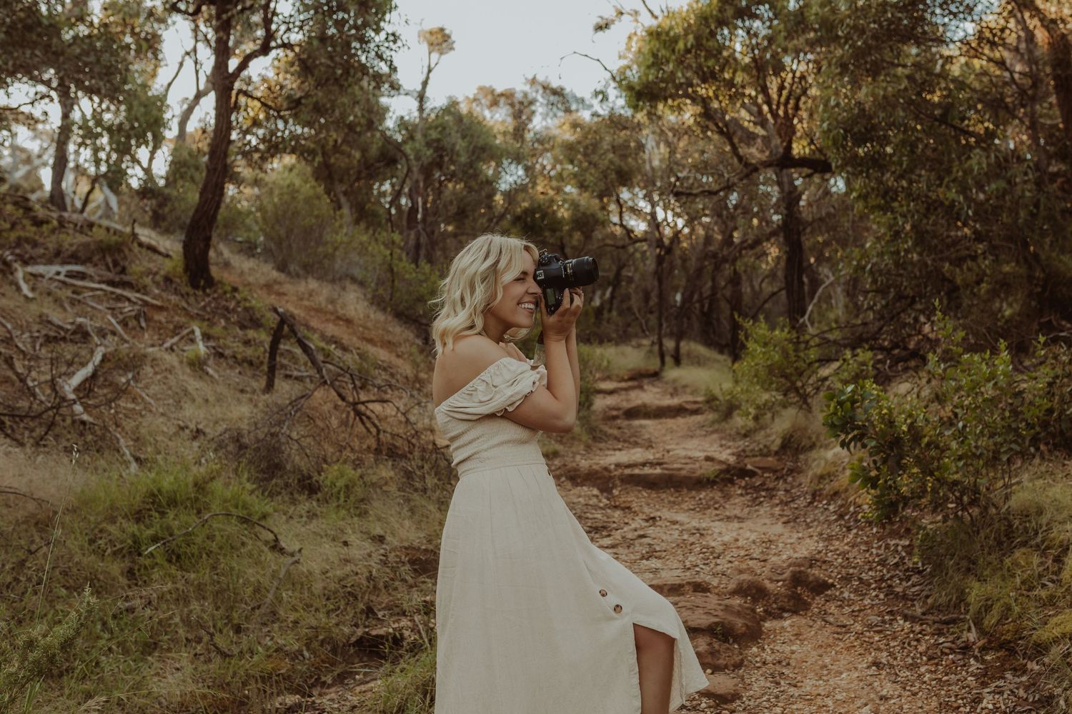 Portrait of Jessica Henderson Photography and her camera, branding photography for photographers