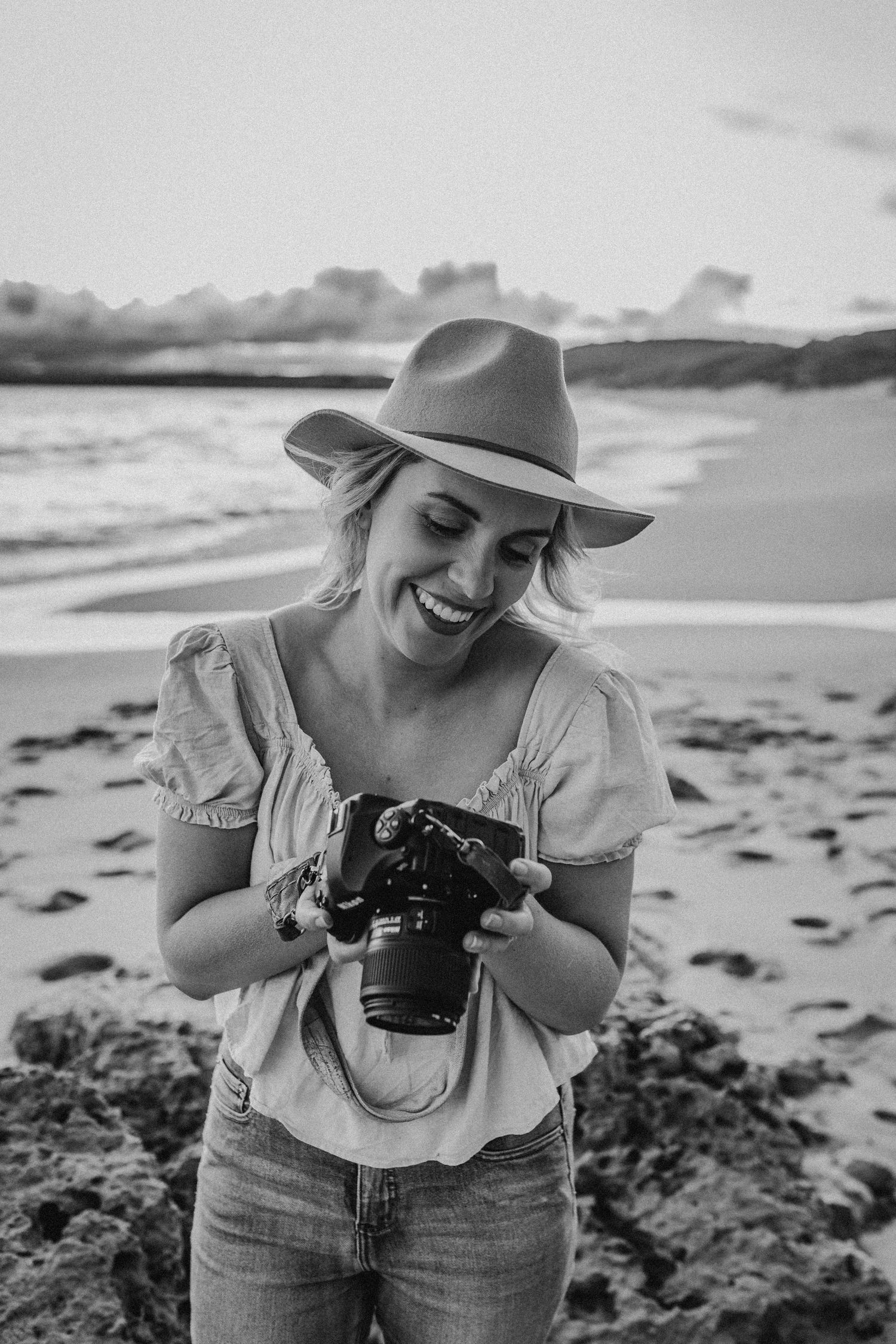 Portrait of Jessica Henderson Photography and her camera, branding photography for photographers