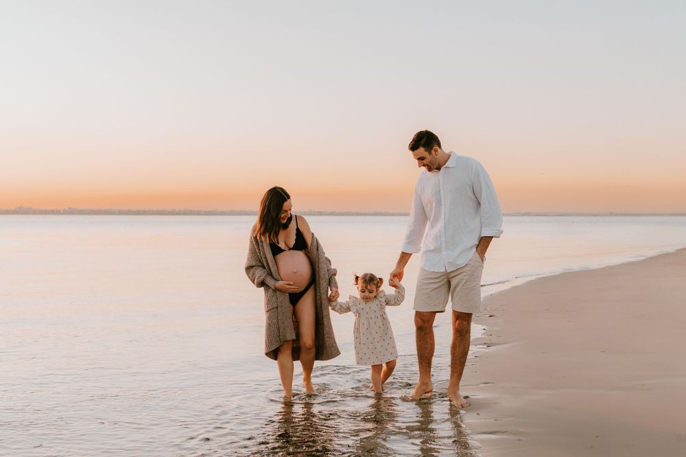 Family walking at the beach