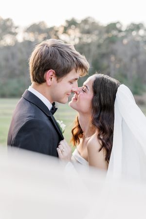A romantic series of wedding photos showing tender moments between newlyweds in an outdoor setting.