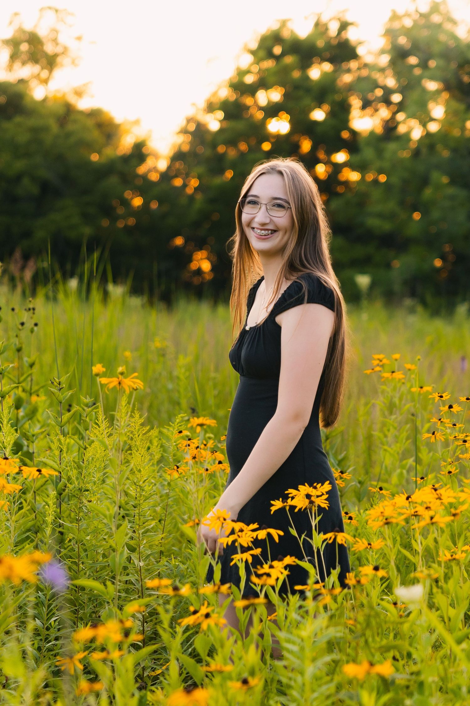 festge county park cross plains wisconsin senior photo location natural wildflowers yellow greenery field epic views rustic stone wall wi