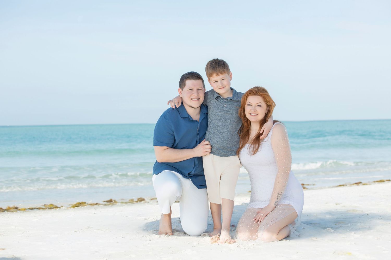 romantic beach engagement couple at Anna Maria Island with turquoise water sunrise Florida and private jet photoshoot at Sarasota airport