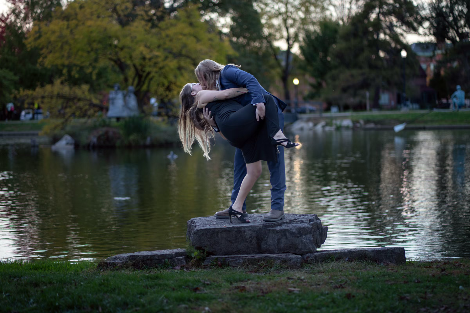 Couple sharing a romantic dip kiss in German Village for Engagement Photos