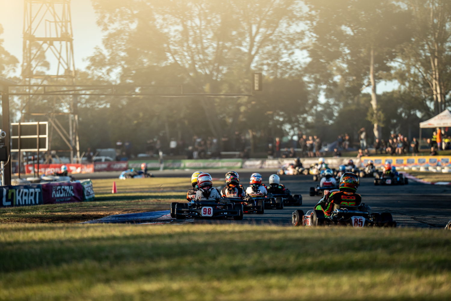 Edward Noon battles mid-pack against the setting sun