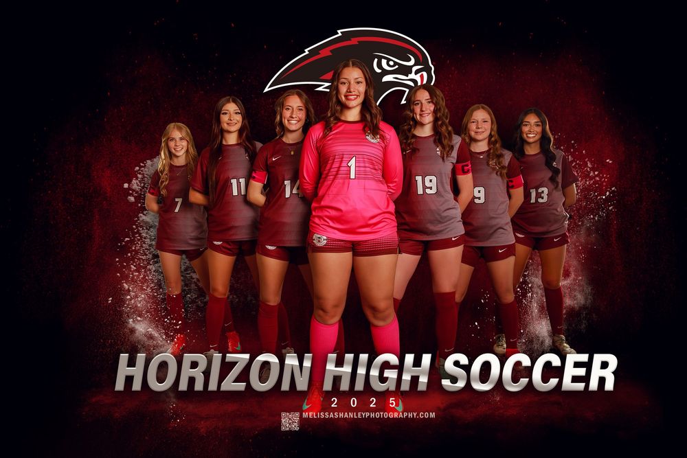 High school soccer team posed for official team photo with red background.