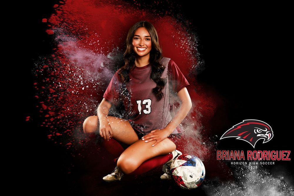 Soccer player portrait with dramatic red smoke effect and ball.