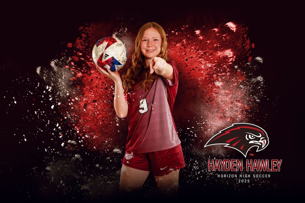 A volleyball player in maroon uniform holds a ball in dynamic pose against an explosive red and black background.