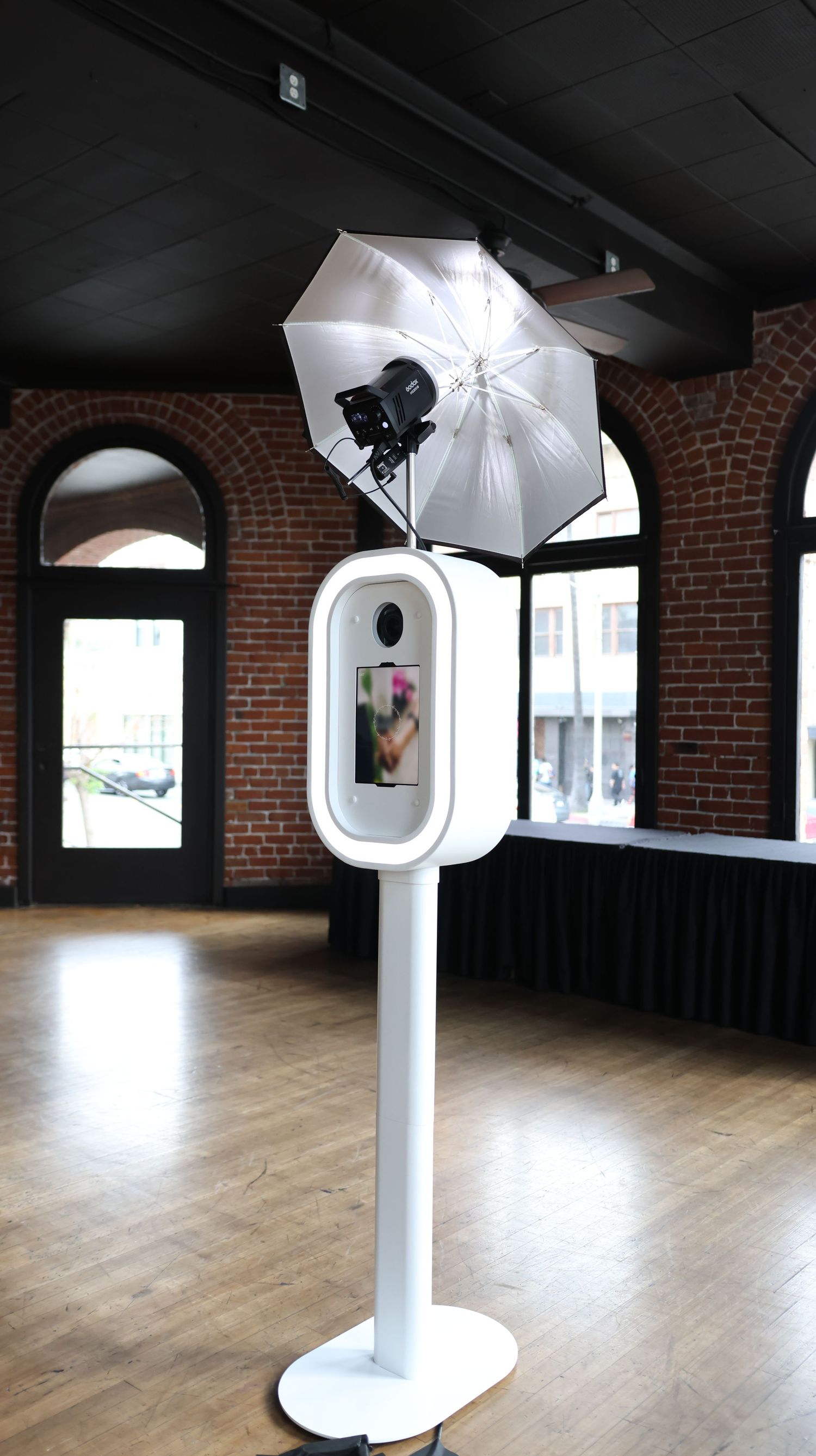 Close-up of a high-resolution DSLR camera in an elegant photo booth setup